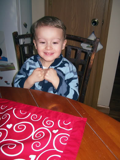 Nathan works on his Valentine cards - CurlyCraftyMom.com